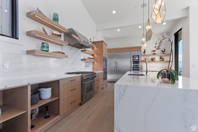 2066 E Oquirrh Mountain Cir, Heber City, UT 84032 - kitchen featuring premium appliances, modern cabinets, wall chimney exhaust hood, and open shelves