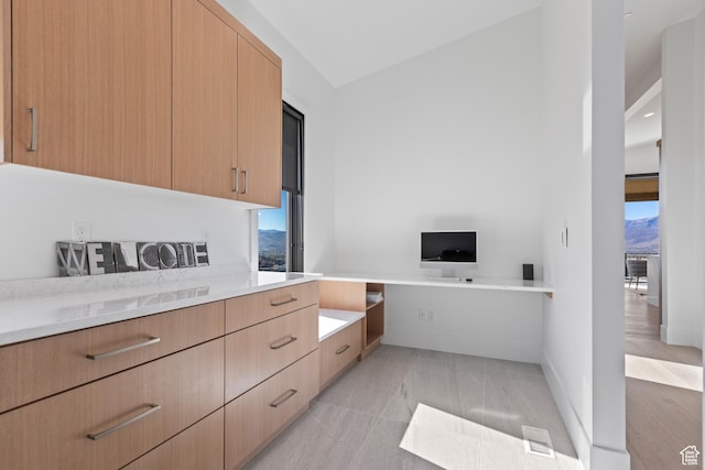 2066 E Oquirrh Mountain Cir, Heber City, UT 84032 - interior space featuring light brown cabinetry, modern cabinets, and light countertops