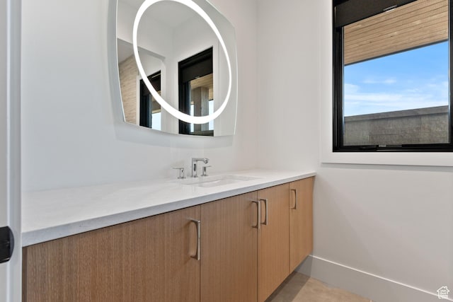 2066 E Oquirrh Mountain Cir, Heber City, UT 84032 - bathroom featuring vanity and baseboards