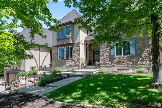 1190 S Eaglenest Dr, Woodland Hills, UT 84653 - view of front of home featuring stone siding, stucco siding, and a front yard