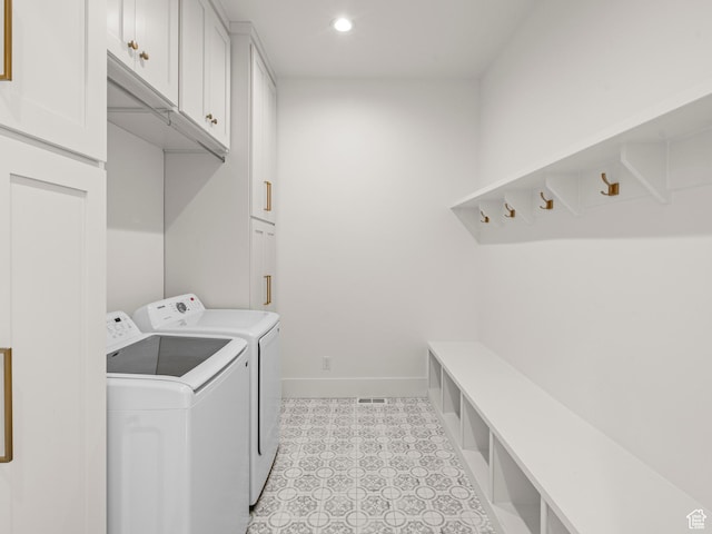 9749 N Hibiscus Ln, Eagle Mountain, UT 84005 - clothes washing area featuring separate washer and dryer, recessed lighting, baseboards, and cabinet space