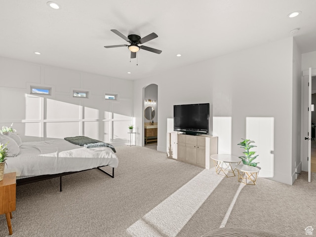 9749 N Hibiscus Ln, Eagle Mountain, UT 84005 - carpeted bedroom featuring arched walkways, recessed lighting, and ceiling fan