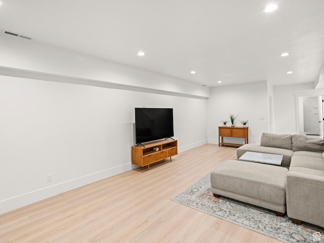 9749 N Hibiscus Ln, Eagle Mountain, UT 84005 - living room with wood finished floors, recessed lighting, and baseboards