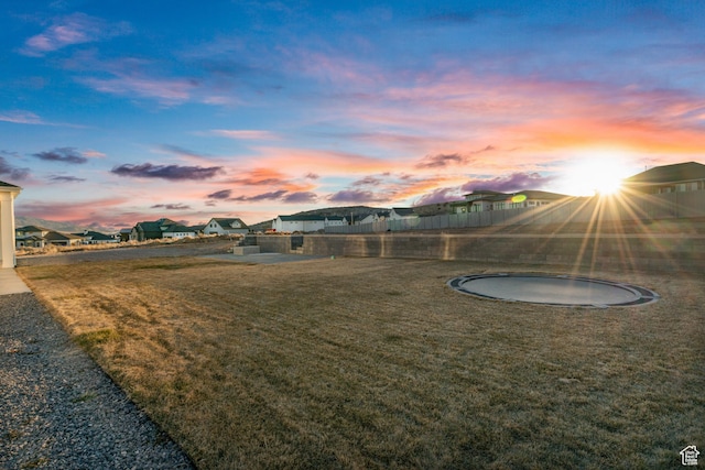 9749 N Hibiscus Ln, Eagle Mountain, UT 84005 - view of green lawn featuring a residential view