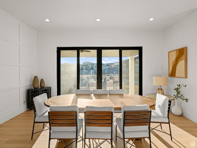 9749 N Hibiscus Ln, Eagle Mountain, UT 84005 - dining space with healthy amount of natural light, light wood-style flooring, and recessed lighting