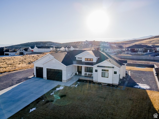 9749 N Hibiscus Ln, Eagle Mountain, UT 84005 - aerial view of residential area with a mountain backdrop
