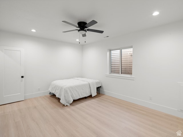 9749 N Hibiscus Ln, Eagle Mountain, UT 84005 - bedroom featuring recessed lighting, wood finished floors, baseboards, and a ceiling fan