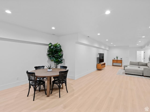 9749 N Hibiscus Ln, Eagle Mountain, UT 84005 - dining room with baseboards, recessed lighting, and light wood finished floors