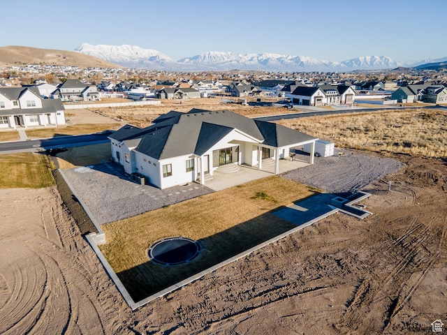 9749 N Hibiscus Ln, Eagle Mountain, UT 84005 - aerial perspective of suburban area with mountains