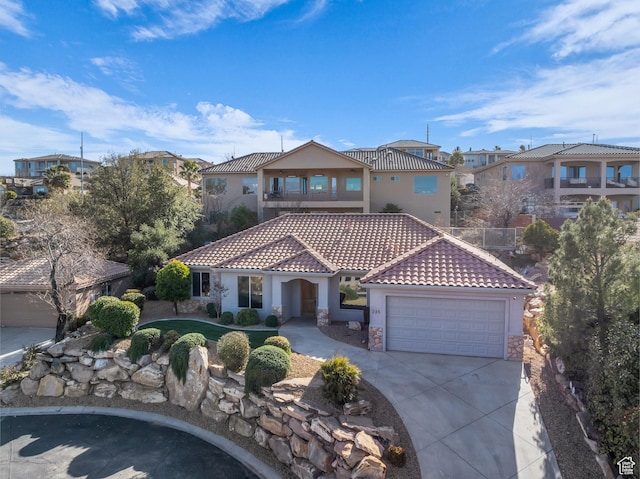 235 W Golden Eagle Cir, St George, UT 84770 - mediterranean / spanish-style home with a garage