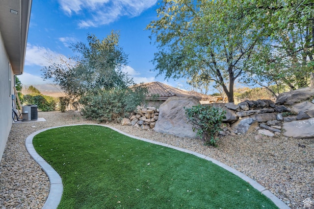 235 W Golden Eagle Cir, St George, UT 84770 - view of yard featuring cooling unit and a mountain view