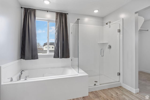 4421 W 150 N, West Point, UT 84015 - bathroom featuring shower with separate bathtub and wood-type flooring