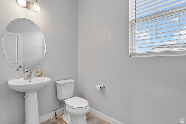 4421 W 150 N, West Point, UT 84015 - bathroom featuring wood-type flooring, sink, and toilet
