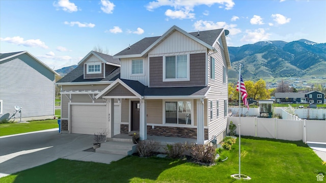 820 S 525 E, River Heights, UT 84321 - craftsman-style home featuring fence, a garage, driveway, and a front yard