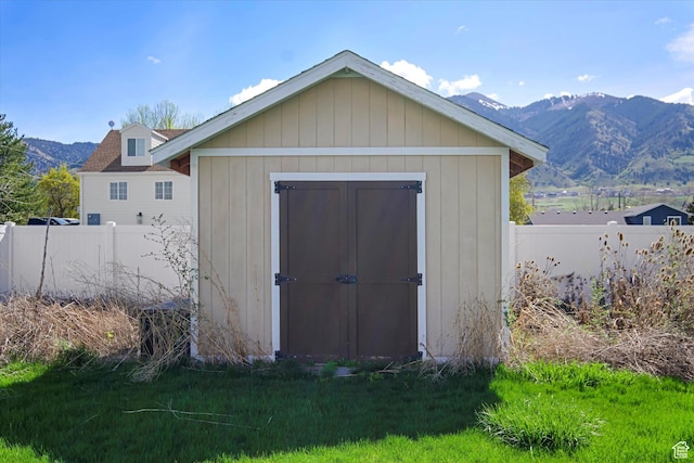 820 S 525 E, River Heights, UT 84321 - view of shed featuring a fenced backyard and a mountain view