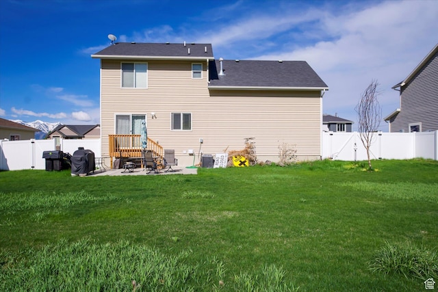 820 S 525 E, River Heights, UT 84321 - back of house with a yard, a patio, a gate, and a fenced backyard