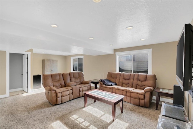 820 S 525 E, River Heights, UT 84321 - living area with baseboards, recessed lighting, and light colored carpet