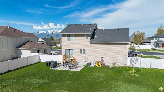 820 S 525 E, River Heights, UT 84321 - rear view of property with a lawn, a fenced backyard, and a patio area
