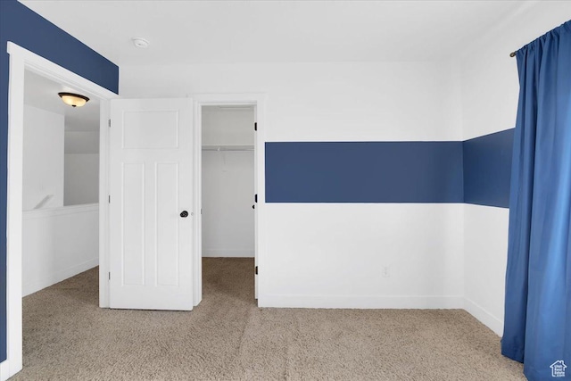 820 S 525 E, River Heights, UT 84321 - unfurnished bedroom with carpet floors, a closet, and a walk in closet
