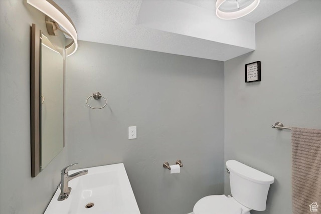 820 S 525 E, River Heights, UT 84321 - bathroom featuring toilet and a sink