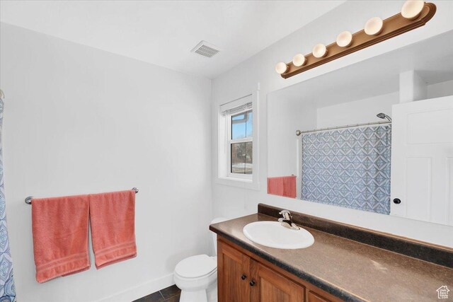 820 S 525 E, River Heights, UT 84321 - bathroom with visible vents, vanity, toilet, baseboards, and a shower with shower curtain