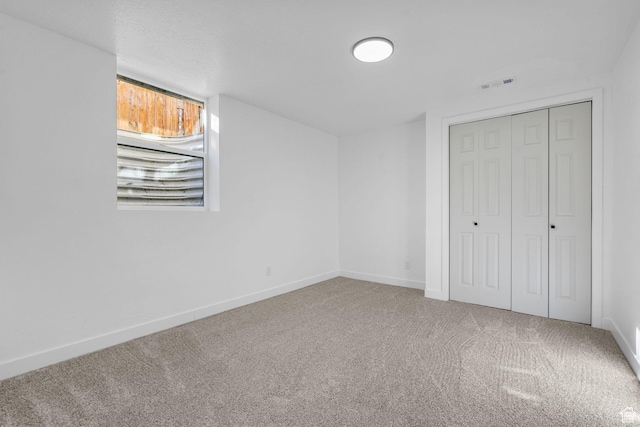 448 N 900 W, Salt Lake City, UT 84116 - unfurnished bedroom with carpet, a closet, visible vents, and baseboards