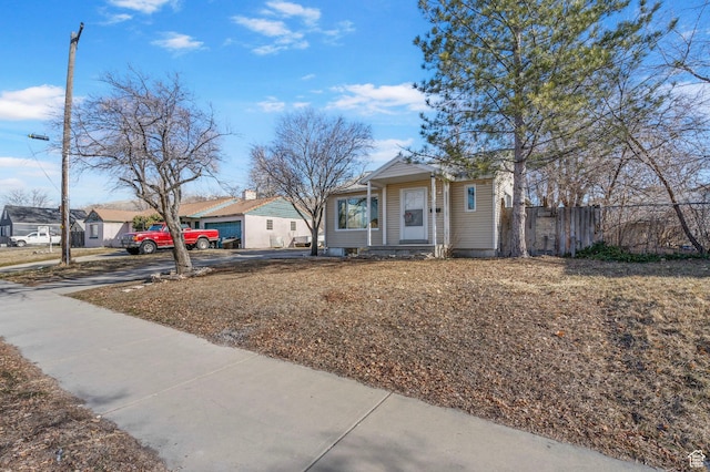 448 N 900 W, Salt Lake City, UT 84116 - view of front of house featuring fence and a residential view