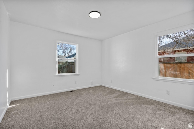 448 N 900 W, Salt Lake City, UT 84116 - carpeted empty room with visible vents and baseboards