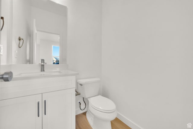 103 E 1760 N, Heber City, UT 84032 - bathroom featuring vanity, hardwood / wood-style floors, and toilet