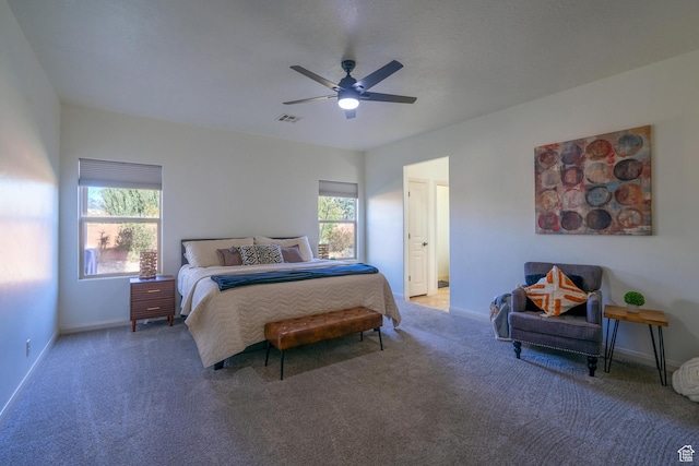 205 E Gold Bullion Way, Washington, UT 84780 - bedroom featuring connected bathroom, carpet floors, and ceiling fan