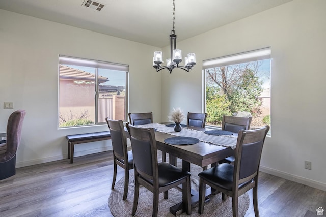 205 E Gold Bullion Way, Washington, UT 84780 - dining room featuring hardwood / wood-style floors and a notable chandelier