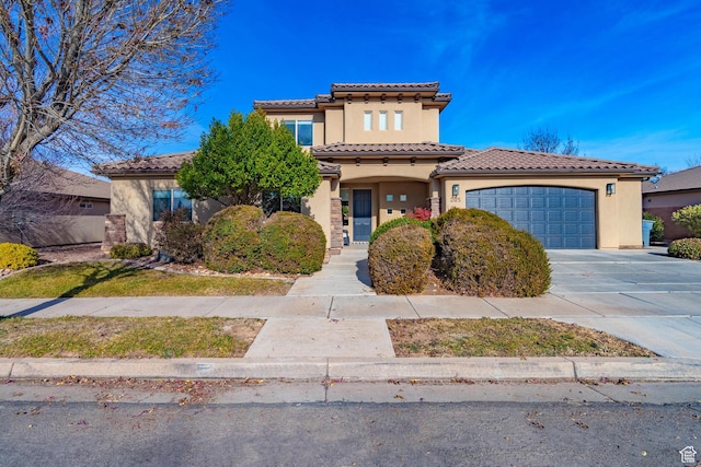 205 E Gold Bullion Way, Washington, UT 84780 - mediterranean / spanish house featuring a garage