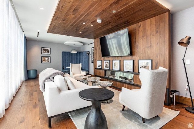 2303 Deer Hollow Rd Unit 1329, Park City, UT 84060 - living room featuring wooden ceiling, light wood-type flooring, and wood walls