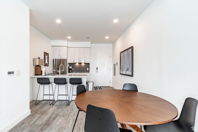 2303 Deer Hollow Rd Unit 1329, Park City, UT 84060 - dining space with sink and light hardwood / wood-style floors