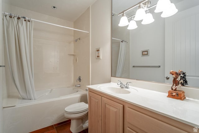 full bathroom with vanity, toilet, tile patterned floors, and shower / bath combo with shower curtain
