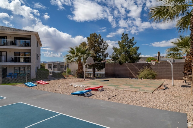 exterior space with basketball hoop