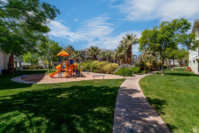 view of play area with a yard