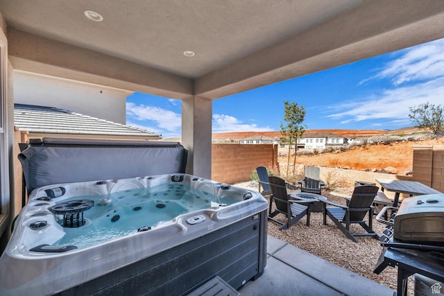 1439 N Arena Roja Dr, Washington, UT 84780 - view of patio / terrace featuring an outdoor fire pit, a hot tub, and a grill