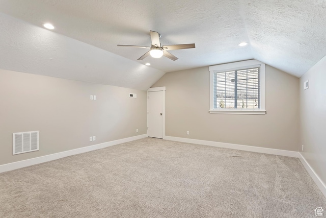 1407 N Mountain Rd, Ogden, UT 84404 - bonus room featuring carpet floors, ceiling fan, vaulted ceiling, and a textured ceiling