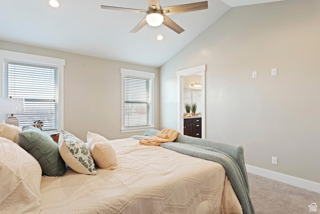 1407 N Mountain Rd, Ogden, UT 84404 - carpeted bedroom with multiple windows, lofted ceiling, ceiling fan, and ensuite bathroom