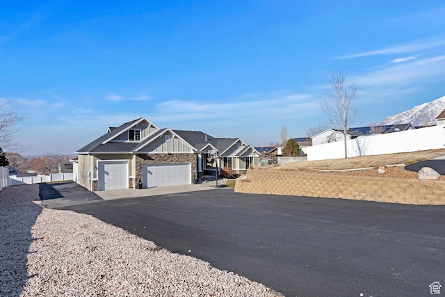 1407 N Mountain Rd, Ogden, UT 84404 - view of front of house with a garage