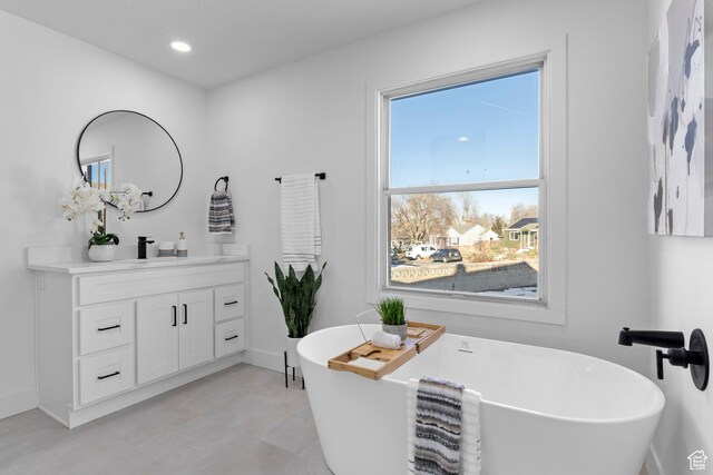 2386 E Lakeview Dr S, Millcreek, UT 84109 - bathroom featuring vanity and a bathtub