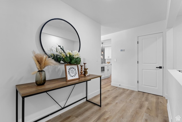 2386 E Lakeview Dr S, Millcreek, UT 84109 - hall with light hardwood / wood-style floors