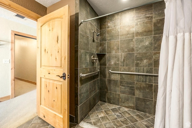 2669 Canyons Resort Dr Unit 101, Park City, UT 84098 - bathroom featuring a textured ceiling and walk in shower