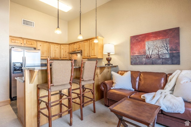 2669 Canyons Resort Dr Unit 101, Park City, UT 84098 - living room with light carpet and a towering ceiling