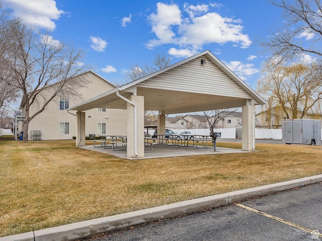 3859 S Mitchell Cv E Unit 203, South Salt Lake, UT 84115 - view of community with a patio and a lawn