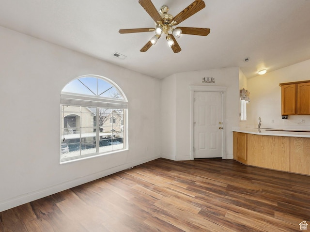 3859 S Mitchell Cv E Unit 203, South Salt Lake, UT 84115 - unfurnished living room with hardwood / wood-style flooring, ceiling fan, and vaulted ceiling