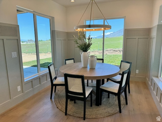994 W Union Bench Dr S, Mapleton, UT 84664 - dining space featuring light wood-style floors, plenty of natural light, recessed lighting, and a decorative wall