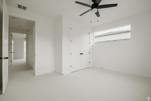 994 W Union Bench Dr S, Mapleton, UT 84664 - unfurnished bedroom featuring multiple windows, visible vents, a closet, and light colored carpet