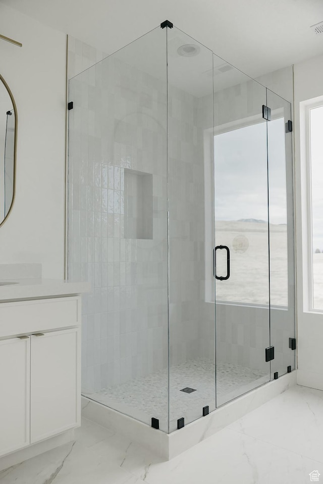 994 W Union Bench Dr S, Mapleton, UT 84664 - full bathroom with a stall shower, marble finish floor, plenty of natural light, and vanity